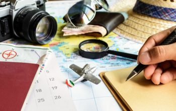 diary and calendar with passport and map